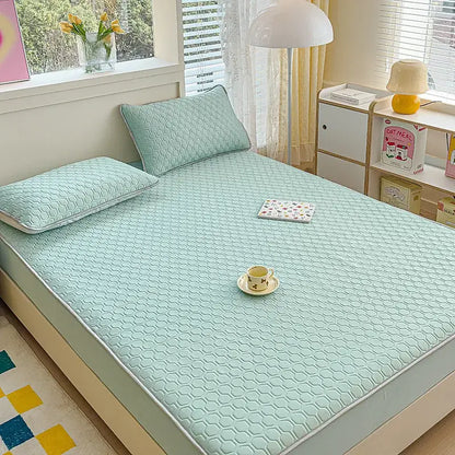 Pastel floral quilted latex fitted sheet set mint green bed pad with hexagonal pattern and light gray piping edges