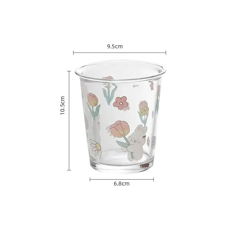 Clear glass tea coffee cup with pastel floral and cute white rabbit holding tulips rabbit glass tea design