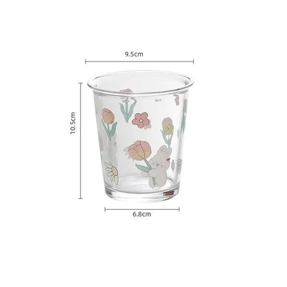 Clear glass tea coffee cup with pastel floral and cute white rabbit holding tulips rabbit glass tea design