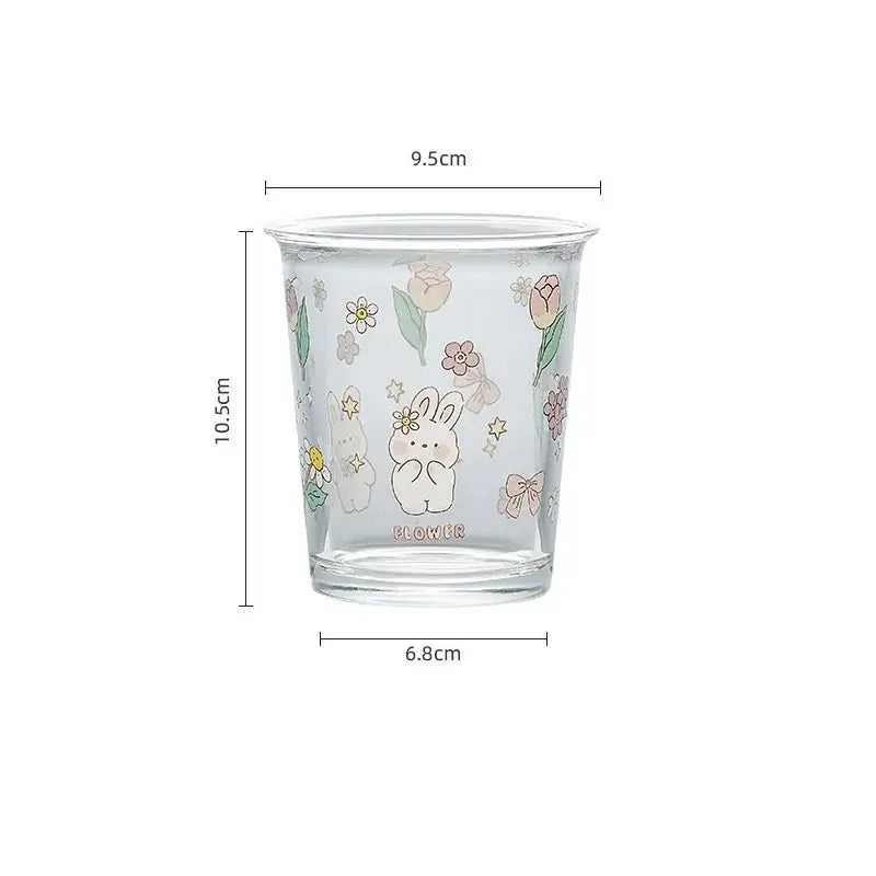 Clear glass tea coffee tumbler with a cute white rabbit and pastel floral illustrations for kitchen use