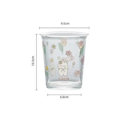 Clear glass tea coffee tumbler with a cute white rabbit and pastel floral illustrations for kitchen use