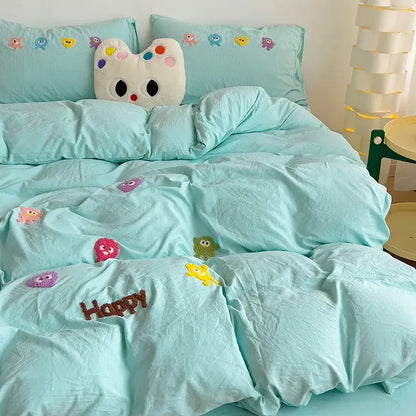 Pastel green quilted bedding set with colorful decorbites cartoon embroidery and happy stitched in brown thread