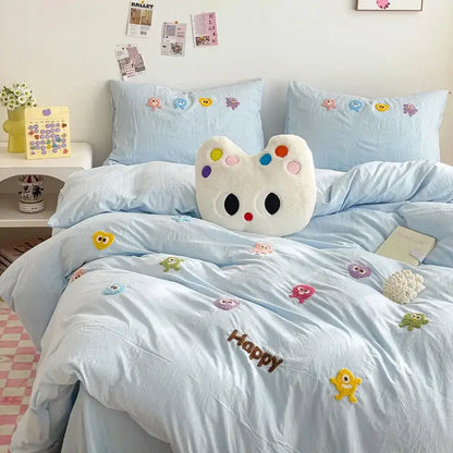 Soft white plush pillow shaped like a cartoon palette with colorful patches in pastel green cartoon towel embroidery bedding set decorbites cartoon towel