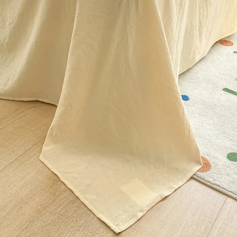 Cream-colored soft textured cotton bedsheet with subtle sheen in pastel green decorbites fresh bubble yarn bedding set