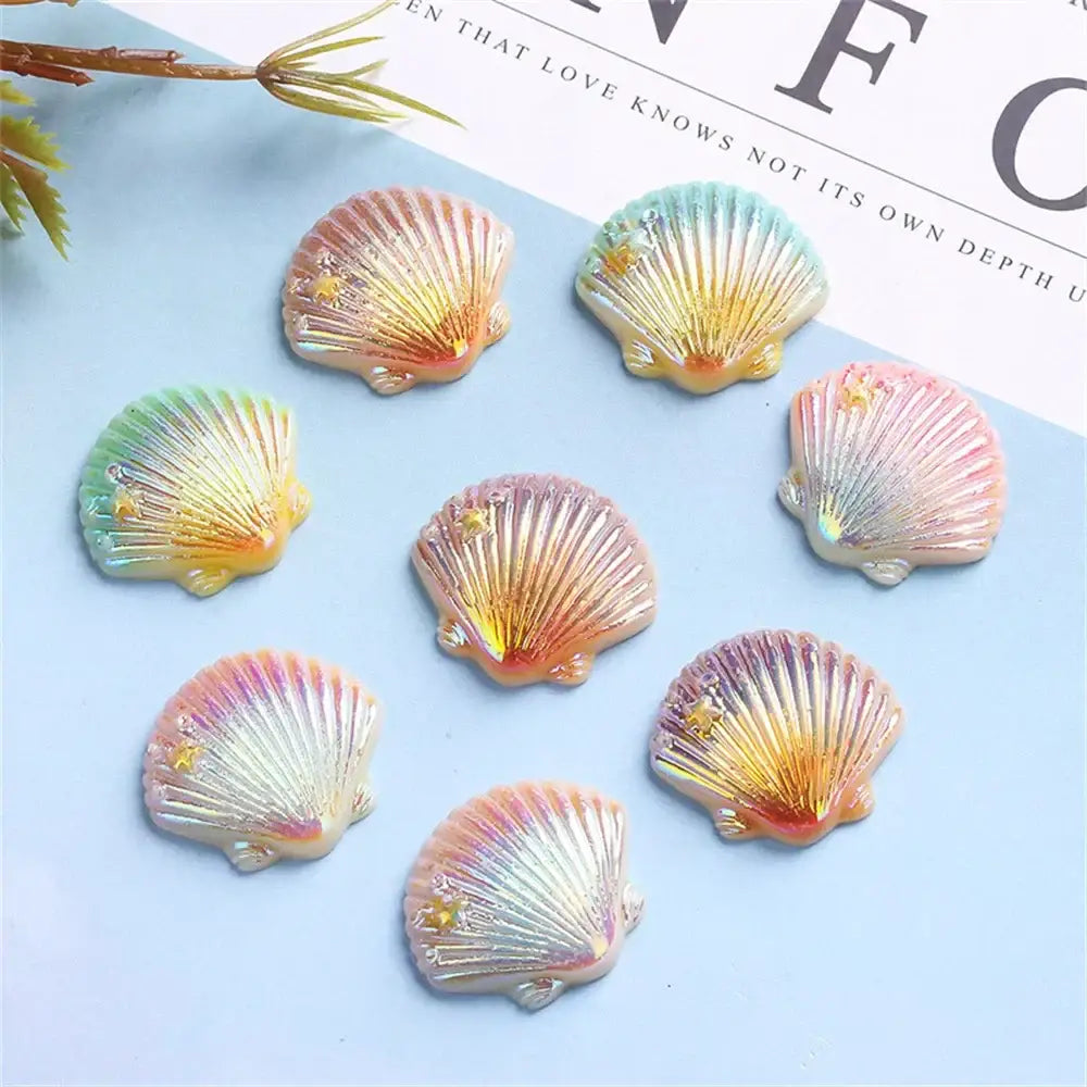 Pastel iridescent colorful pearl shells resin charms with delicate starfish accents for shells beach decor and bedroom art