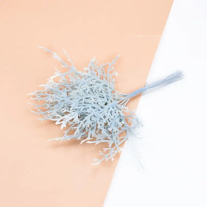 A delicate light blue artificial plants arrangement with intricate branching stems from decorbites 10pcs artificial set for living room decor