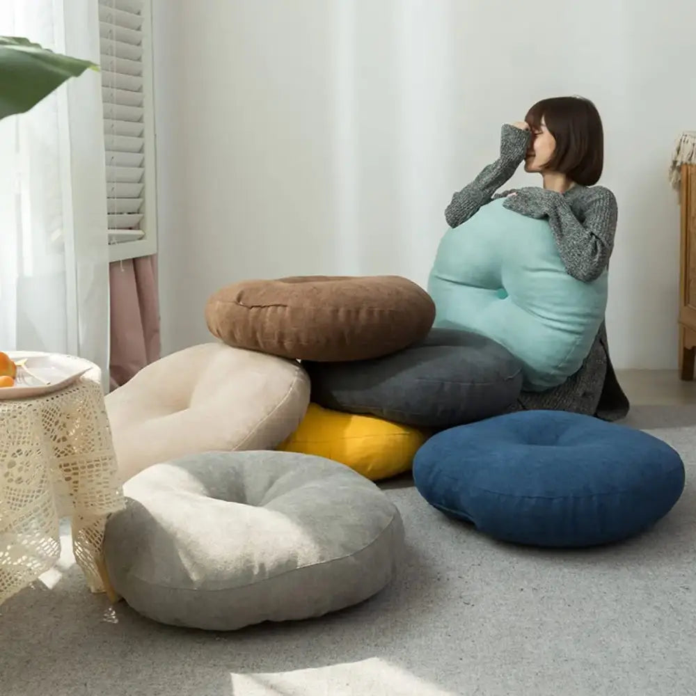 A collection of pastel and earthy decorbites linen round floor cushions for living room meditation and decorbites linen round use