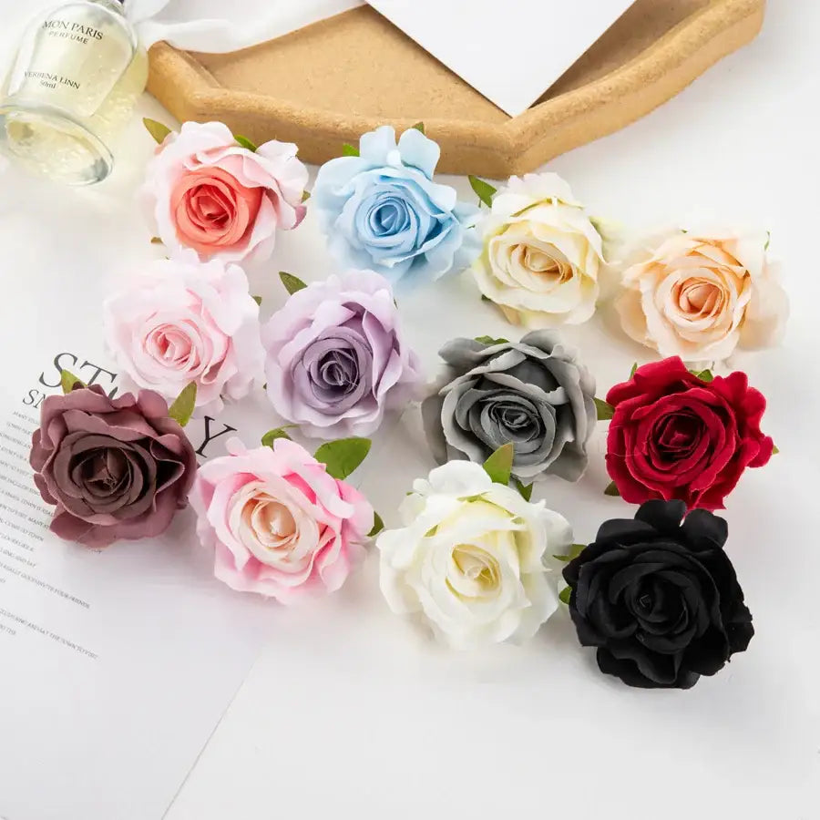 A collection of decorbites 100pcs multicolor silk artificial flowers in pastel and bold hues with realistic petal layers