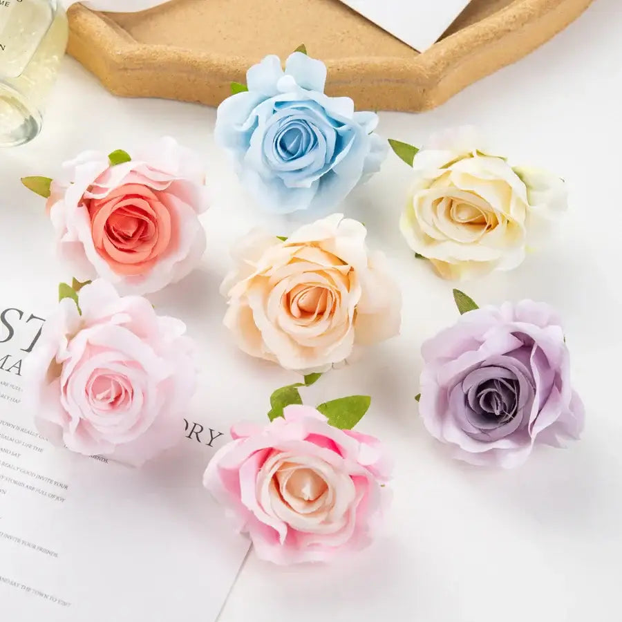 A collection of pastel multicolor silk artificial flowers featuring 100pcs delicately crafted roses for decorbites wedding decor