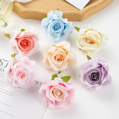 A collection of pastel multicolor silk artificial flowers featuring 100pcs delicately crafted roses for decorbites wedding decor