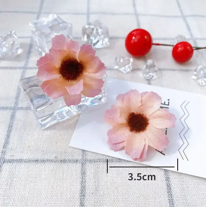 Pastel pink and lavender mini daisy artificial flowers with dark brown centers crafted from delicate material for decorbites mini daisy decor