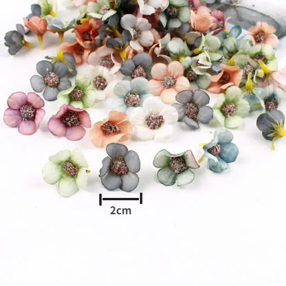 A collection of pastel pink and lavender decorbites mini daisy artificial flowers with textured centers for wedding decor