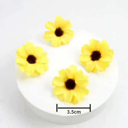 Bright yellow artificial sunflowers with dark centers on white base complement decorbites mini daisy artificial flowers wedding decor