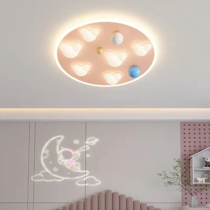 Pastel pink oval ceiling light with white mickey mouse bulbs and colorful accents for decorbites cloud shape ceiling lights