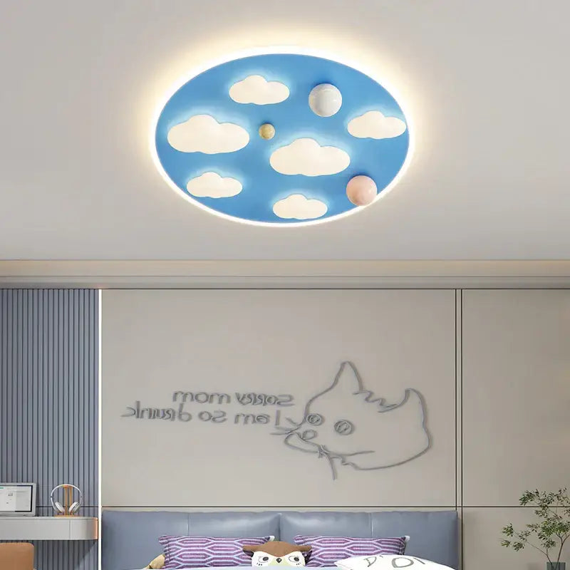 Blue oval ceiling light with white cloud and planet decals perfect for decorbites cloud shape ceiling bedroom decor