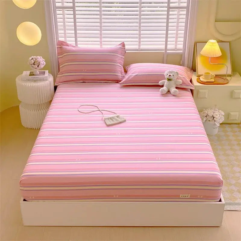 Pastel pink and blue decorbites cotton striped fitted sheet with pink stripes and lavender white accents in soft cotton