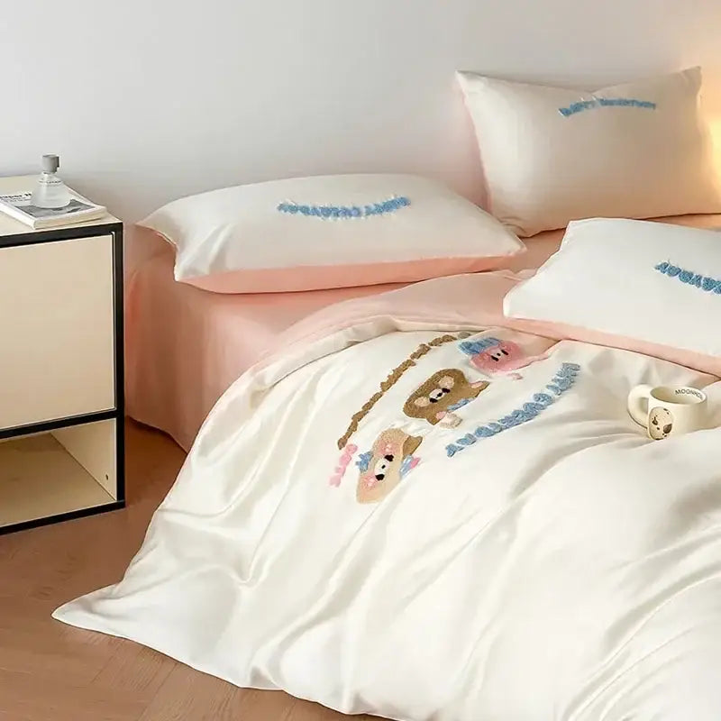 Cream-colored satin duvet cover with blue lettering featuring decorbites cartoon embroidery cotton bedding set design