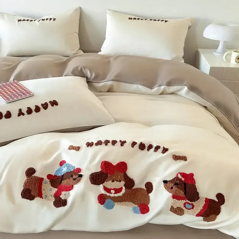 Cream-colored duvet cover with cartoon embroidery cotton featuring brown puppies in festive hats from decorbites bedding set