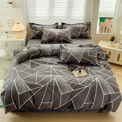 Gray geometric-patterned bedding set with white angular lines and textured fabric in decorbites cozy cotton bedding