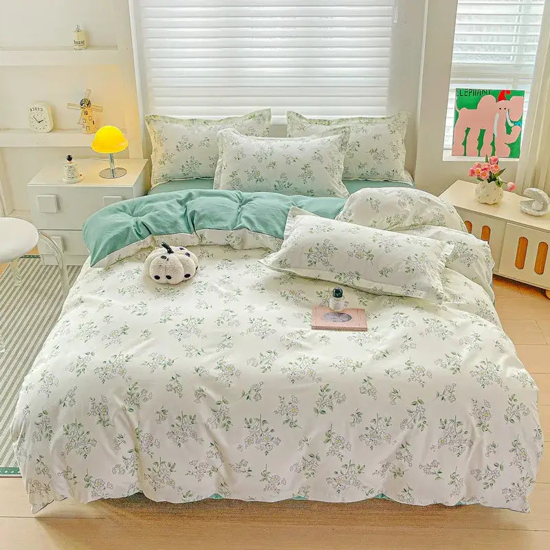 Pastel pink and cream butterfly cozy cotton bedding set featuring a soft white floral duvet with ruffled edges and mint lining