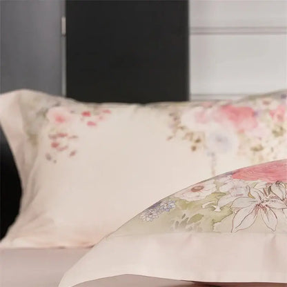 Cream-colored pillowcases with delicate pink and green floral patterns in pastel pink floral egyptian cotton bedding set duvet cover