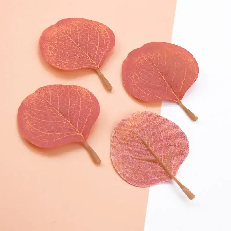 Four translucent coral-pink resin leaf pendants with vein patterns and brown stems for silk leaf artificial plants home decor
