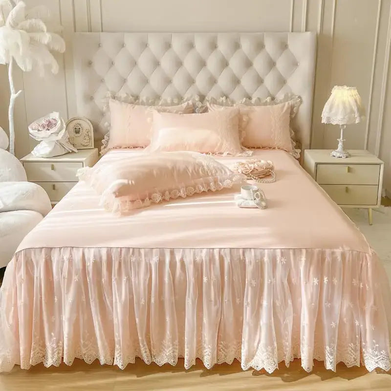 Pastel pink lace ruffled bed sheet set with delicate lace trim and floral embroidery for bedroom bedspread use