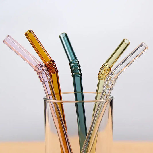 A pastel ridged glass straws set in pink amber teal and gold featuring textured eco friendly decorbites glass straws