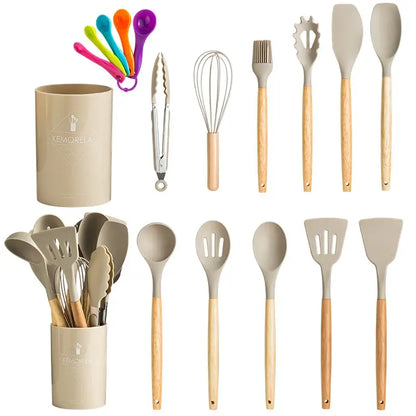 Beige silicone kitchen utensils set with wooden handles and matching ceramic storage canister for kitchen use
