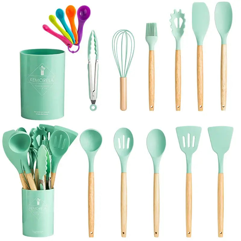 Pastel silicone kitchen utensils set with mint green silicone and wooden handles including spoons spatulas tongs and whisk