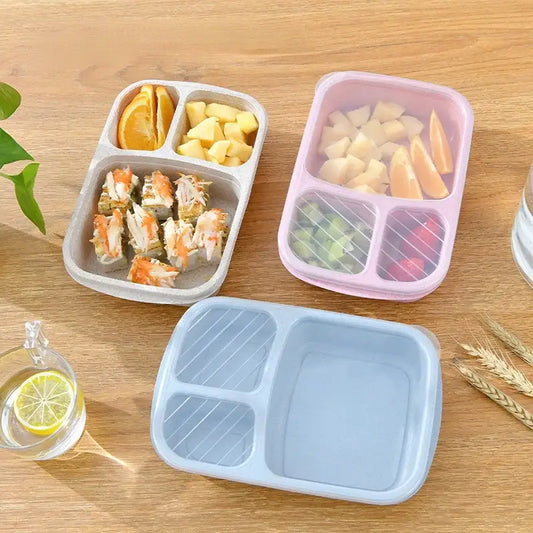 Pastel wheat straw bento box set with three compartments and clear lids featuring striped dividers for kitchen use