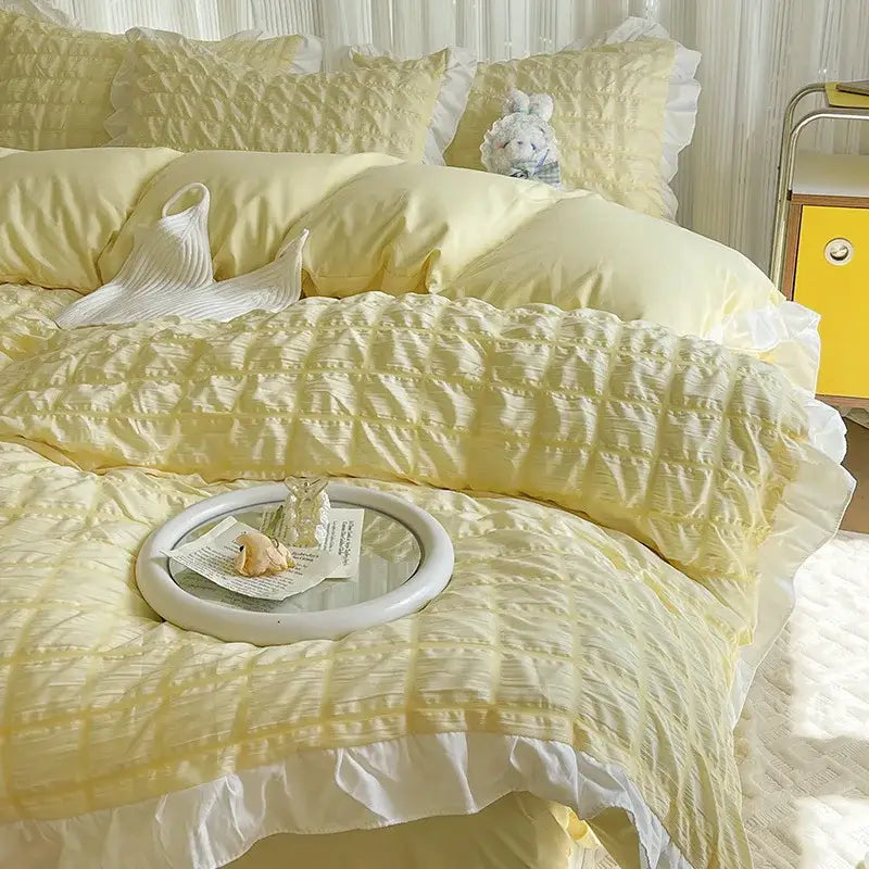 Pastel yellow bubble cotton lace bedding set with quilted ruffles and matching pillows by decorbites bubble cotton