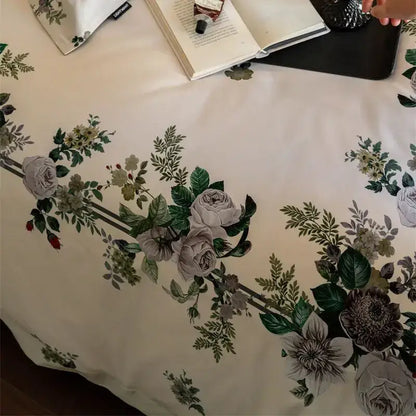 Beige bedding set with intricate gray green and muted burgundy floral patterns made from 1000tc egyptian cotton