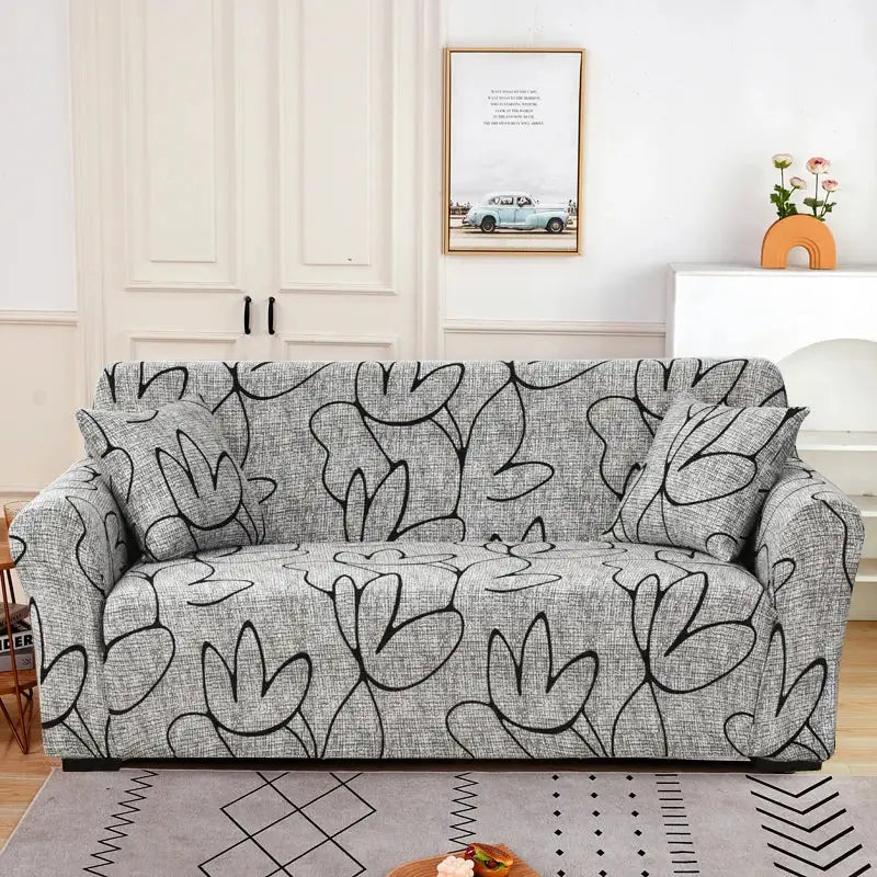 Patchwork mandala printed stretch sofa cover in gray with black outlined floral pattern for living room slipcover