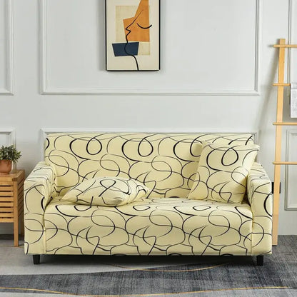 Cream-colored stretch sofa cover with black abstract swirl patchwork mandala print for living room slipcover use