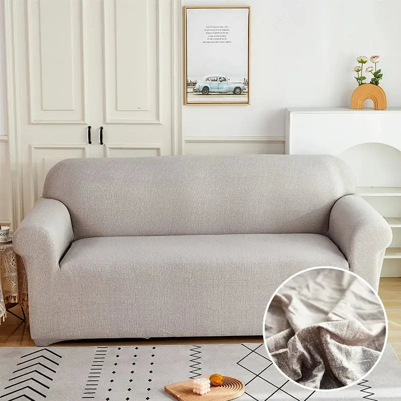 Beige textured fabric stretch sofa cover with patchwork mandala print for living room slipcover use