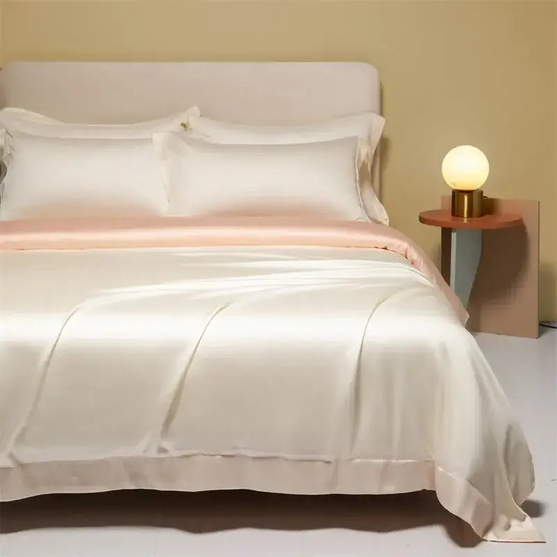 Cream-colored satin duvet cover with subtle pink lining in peach satin cooling cotton solid bedding set for bedroom
