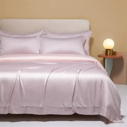 A soft lavender satin duvet cover set with ruffled edges in cooling cotton solid bedding for the bedroom