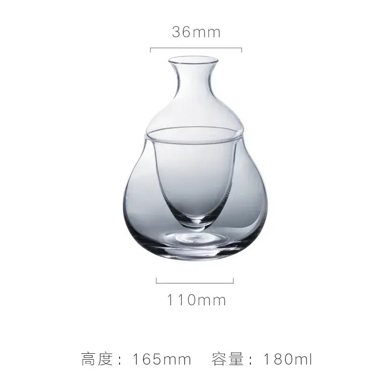 Clear glass pear shaped wine decanter and ice jug set with sleek modern design and integrated inner cup for dining room decor