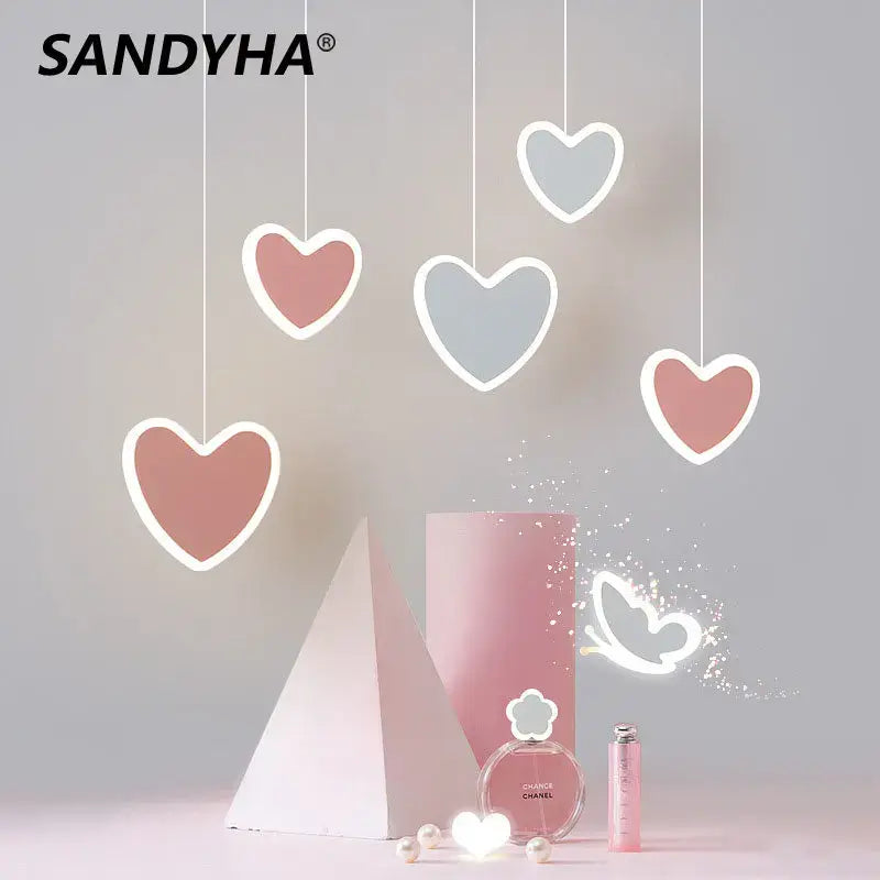 Pink and gray heart blossom butterfly led chandelier with white outlines and thin cords for bedroom lighting