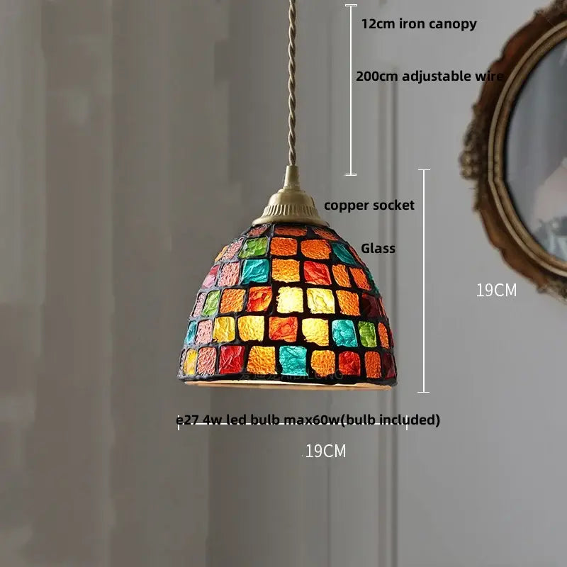 A vibrant dome-shaped decorbites glass ball led pendant light with colorful mosaic panels for kitchen decor