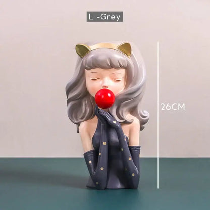 A charming light grey resin bubble gum girl figurine with gold cat ears and red nose in a flower vase decorbites bubble gum design