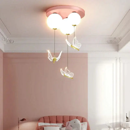 Pink and white butterfly ball ceiling lamp with three glowing globe bulbs and delicate pendant lights for bedroom decorbites butterfly ball