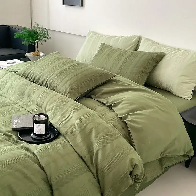 Olive green textured bedding set with woven pattern and matching pillows from decorbites cotton jacquard bedding collection