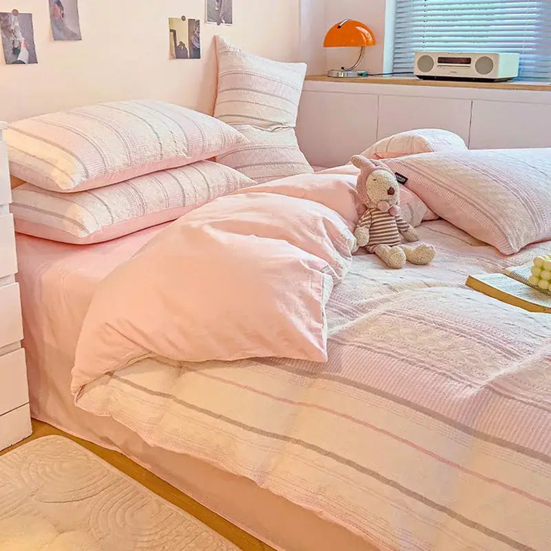 Pink and cream striped cotton jacquard bedding set with soft textured fabric for bedroom decor by decorbites cotton jacquard