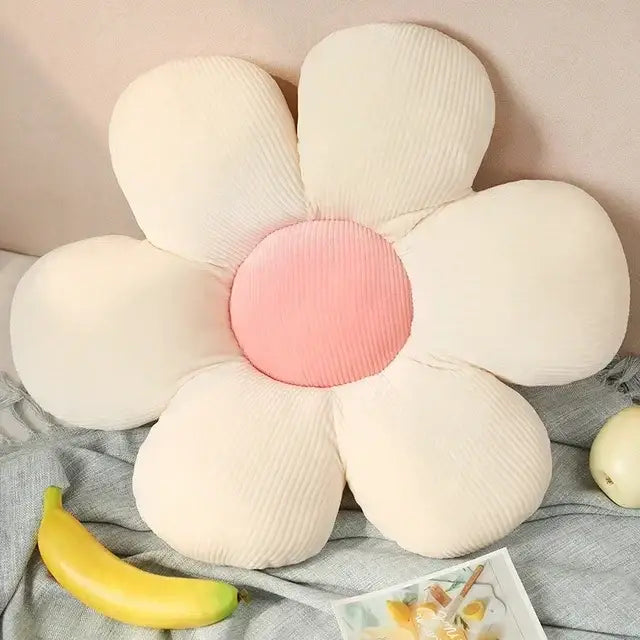 Cream-colored corduroy daisy lumbar support pillow with a soft pink center for decorbites daisy lumbar use