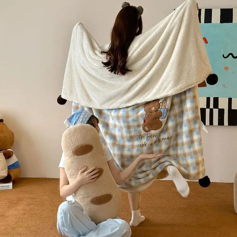 Cream-colored plush cartoon patch woolen blanket with fur balls featuring teddy bear bread design for decorbites bedroom decor