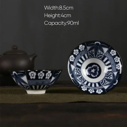 Blue and white porcelain hand-painted ceramic tea bowl with intricate floral and geometric patterns from decorbites