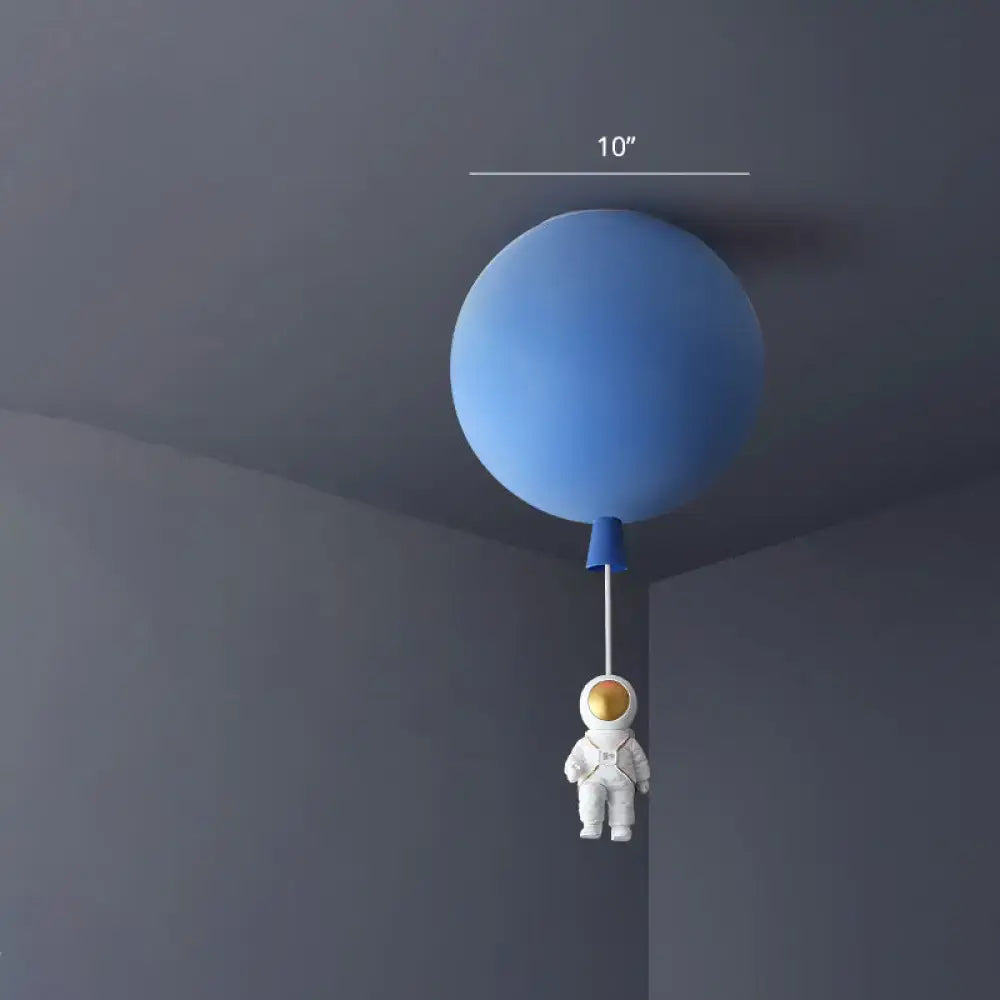Blue balloon-shaped astronaut ceiling lamp with white astronaut figurine pendant for bedroom lighting