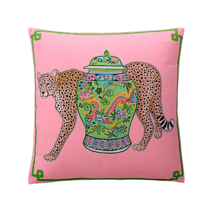 Pink lumbar pillow cover featuring a green porcelain jar with floral and dragon motifs and two spotted cheetahs for blue lion dog decor